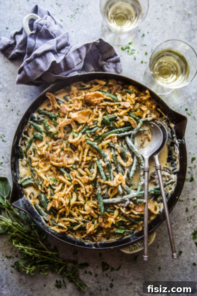 One-Pan Green Bean Casserole 2 homemade green bean skillet casserole, freshly baked and ready to serve