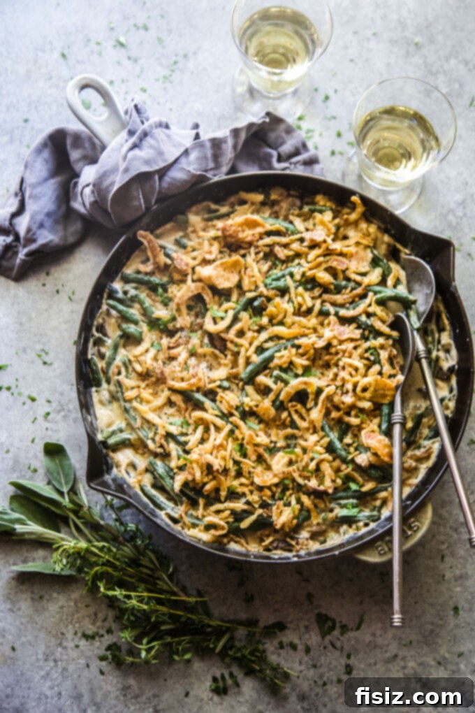 One-Pan Green Bean Casserole 10 homemade green bean skillet casserole, garnished with fresh herbs