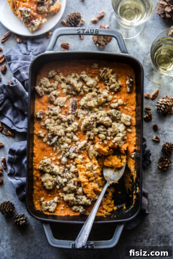 Old-fashioned sweet potato casserole, a classic Thanksgiving side dish with creamy sweet potatoes and pecan streusel topping.