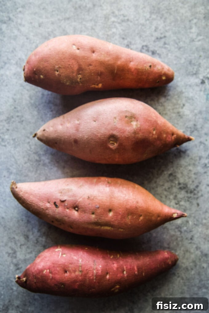 Ingredients for creamy sweet potato base: sweet potatoes, butter, milk, sugar, eggs, and spices.