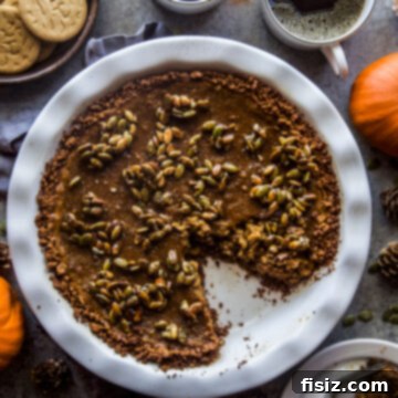 Gingersnap-Crusted Pumpkin Pie with Candied Pepitas 12 Pumpkin Pie with Gingersnap Crust & Candied Pepitas