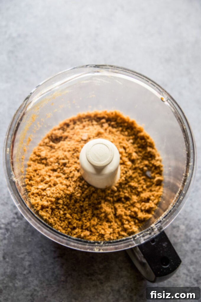 Gingersnap-Crusted Pumpkin Pie with Candied Pepitas 4 Melted unsalted butter, a key ingredient for the crust.