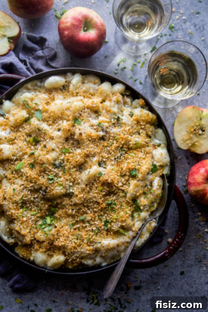 Smoky Cheddar Apple and Poblano Gnocchi Bake 3 Another enticing view of the Apple & Poblano Gnocchi Bake, showcasing its cheesy topping and vibrant ingredients.