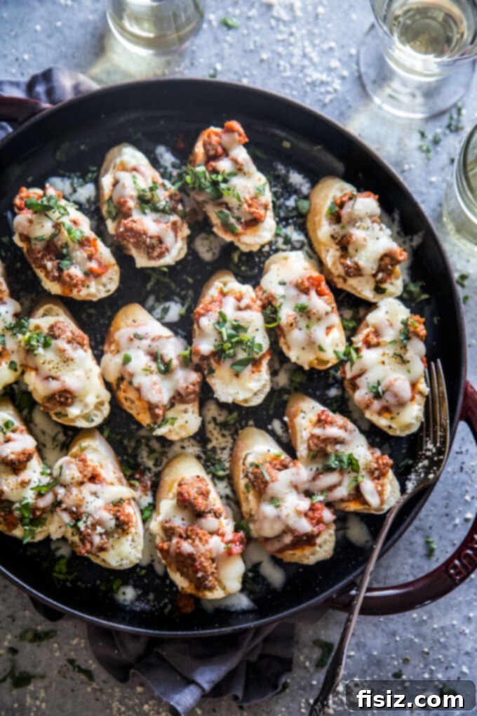Mini Lamb Lasagna Crostini 2 These Lamb Lasagna Crostini are meaty and cheesy Italian appetizers that are perfect for parties, picnics, and potlucks! They are made of crispy toasted bread slices topped with scrumptiously spiced and saucy ground lamb and three kinds of cheese. You’ll have these savory baked bites done in just 30 minutes!