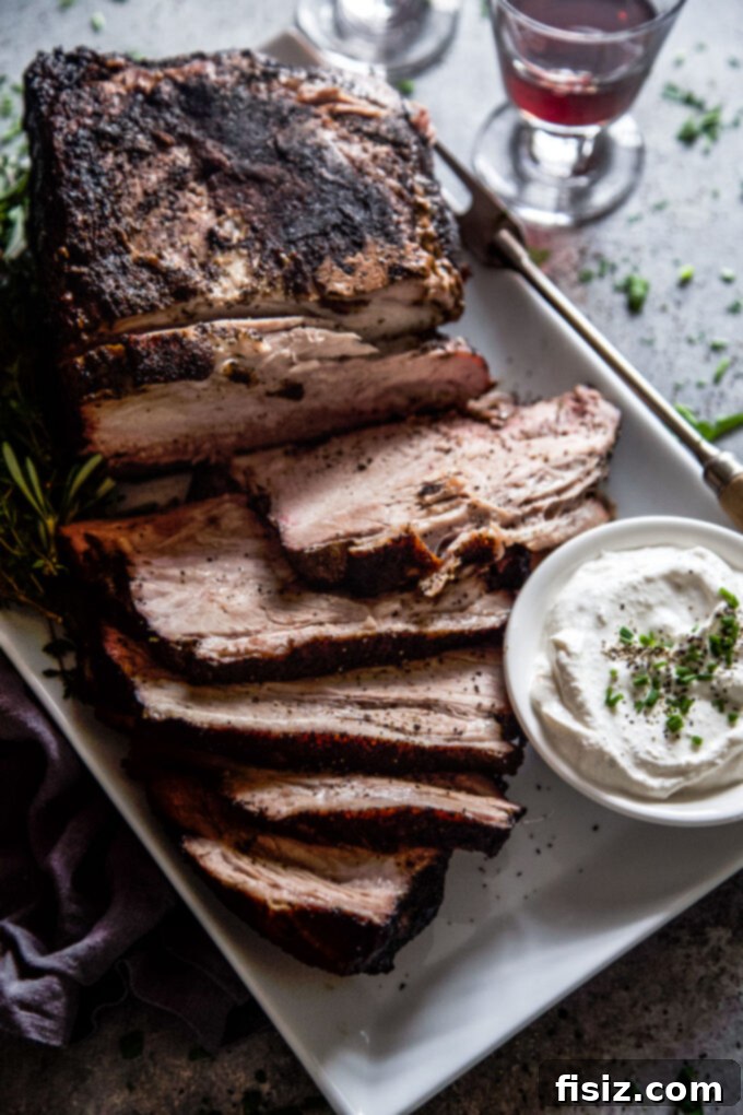 Slow-Roasted Coffee-Rubbed Pork Shoulder 10 Plated Oven Roasted Coffee-Rubbed Pork Shoulder with sides.