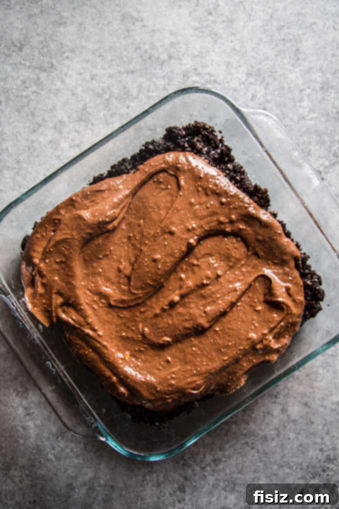 Decadent Hot Cocoa Cheesecake Bars 4 Ingredients for Oreo Cookie Crust and Cheesecake Filling