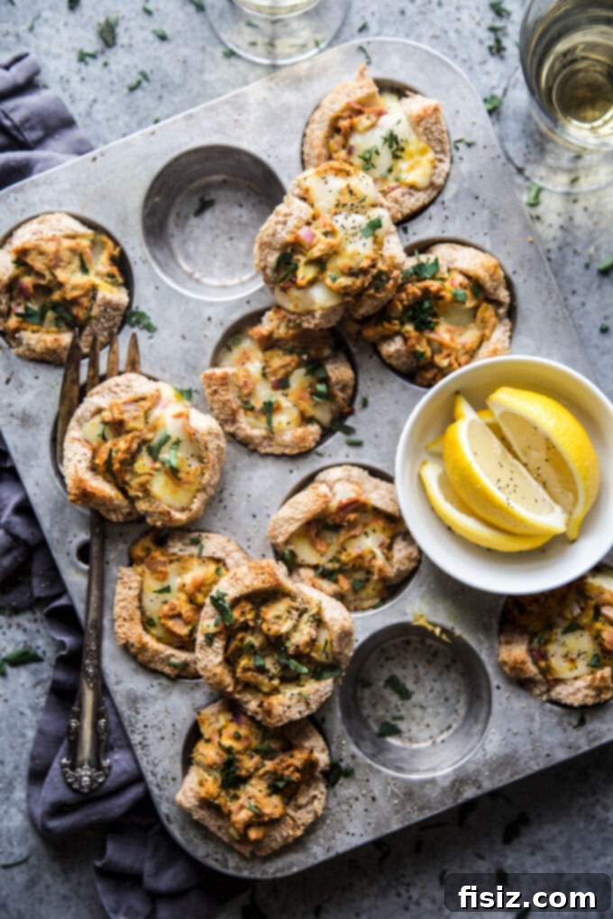 Turmeric Tuna Melts in Muffin Tins 9 Freshly baked Muffin Pan Turmeric Tuna Melts garnished with parsley