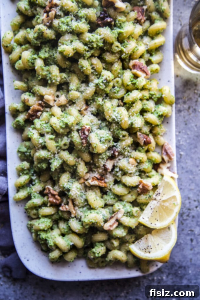 Vibrant Broccoli Walnut Pesto Pasta 3 Close-up of Broccoli Walnut Pesto Pasta showcasing the creamy sauce and pasta texture