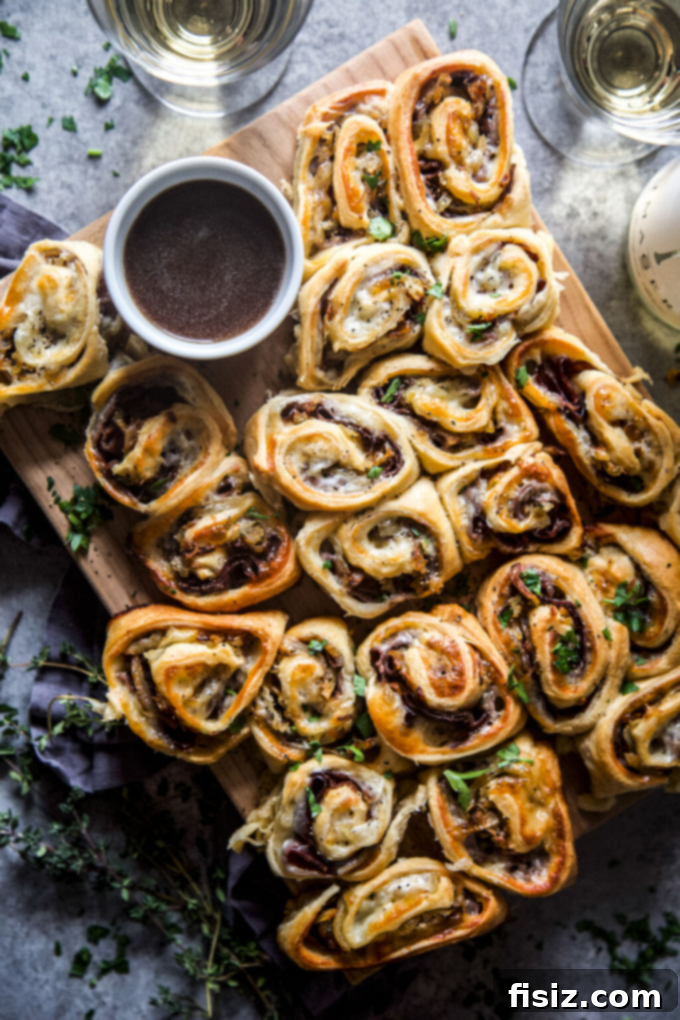 45 Delicious Recipes to Make This February 8 Easy French Dip Pinwheels, perfect for Super Bowl or any gathering