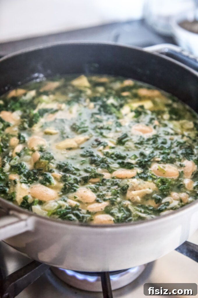 green goddess white bean soup on the stove www.thecuriousplate.com