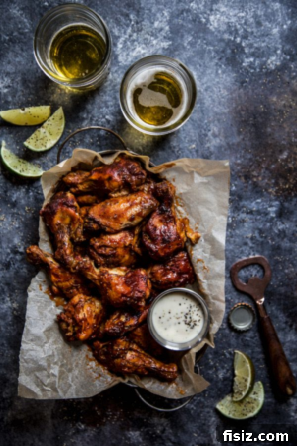 Score Big: 35+ Ultimate Game Day Eats 2 Flavorful Slow Cooker Chipotle Bourbon Chicken Wings, a perfect appetizer for your game day feast