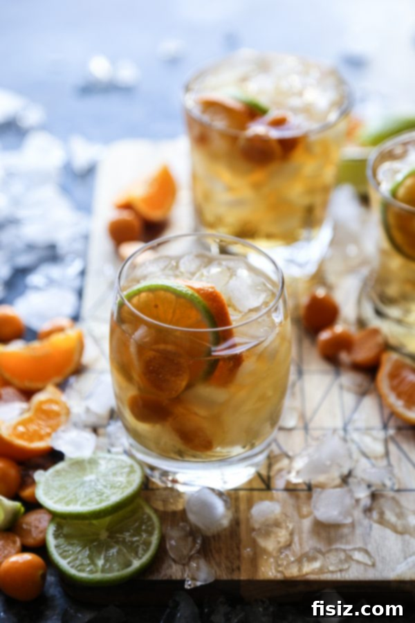 Score Big: 35+ Ultimate Game Day Eats 3 Refreshing Orange Ginger Julep, a vibrant cocktail perfect for game day celebrations
