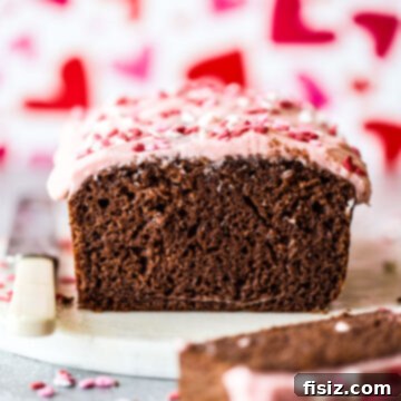 Delicious chocolate loaf cake with cherry frosting, a delightful dessert idea.