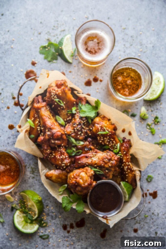 Smoky Gochujang Wings 9 A platter of beautifully garnished smoked korean style hot wings