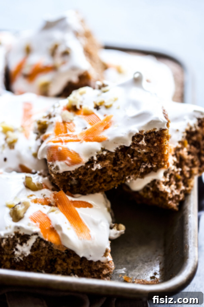 Spring into Flavor: 44 Recipes to Cook in April 9 Cardamom-Spiced Carrot Cake with Ginger Marshmallow Frosting: A festive April dessert.