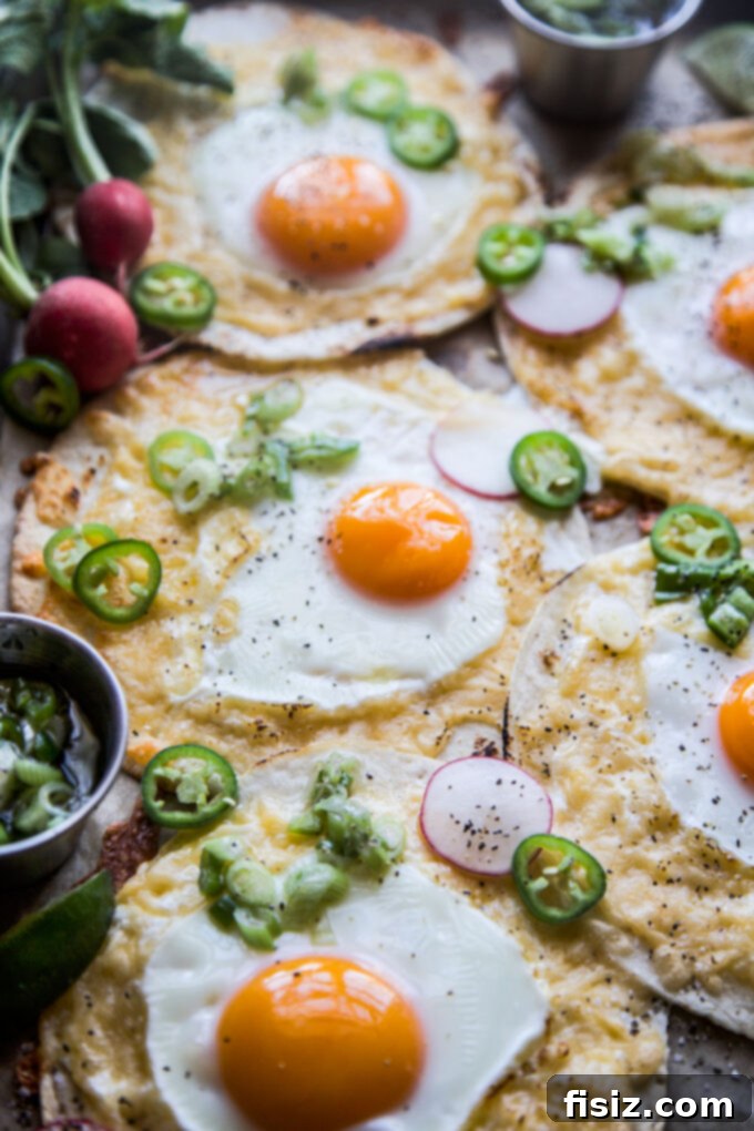 One-Pan Breakfast Tacos with Zesty Scallion Salsa 3 Close-up of a cooked Sheet Pan Breakfast Taco, ready to be garnished.