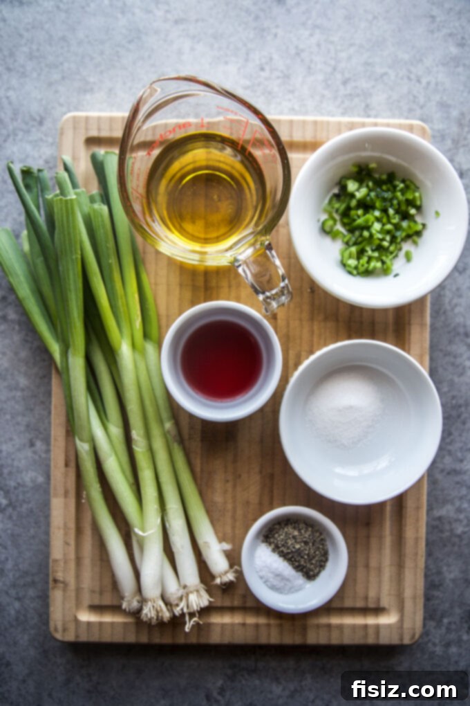 One-Pan Breakfast Tacos with Zesty Scallion Salsa 6 Various ingredients for fresh scallion salsa laid out on a cutting board.