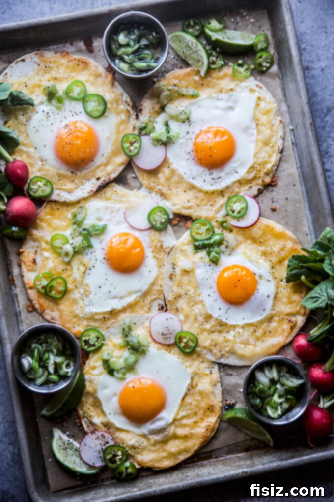 One-Pan Breakfast Tacos with Zesty Scallion Salsa 8 Platter of Sheet Pan Breakfast Tacos with various garnishes and fresh scallion salsa.