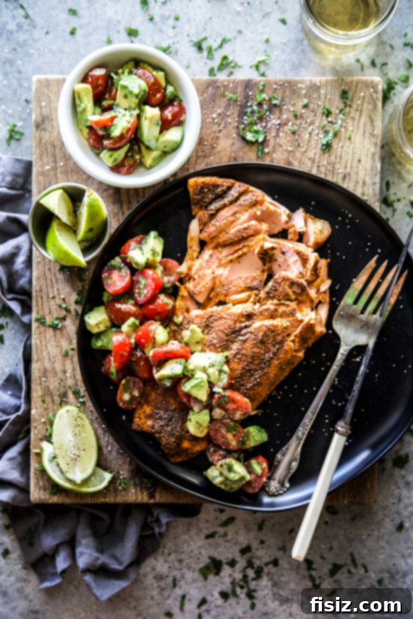 56 Must-Try Recipes for May 3 Mumbai Baked Salmon with a vibrant Avocado Salsa, perfect for a light and healthy May meal