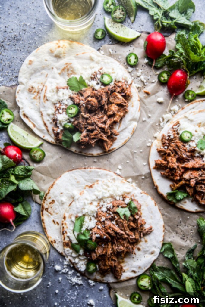 Melt-in-Your-Mouth Slow Cooker Al Pastor Lamb Tacos 2 Delicious Slow Cooker Al Pastor Lamb Shoulder Tacos ready to serve