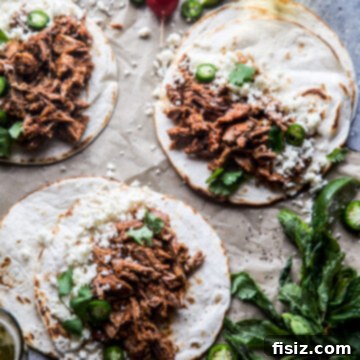 Slow Cooker Al Pastor Lamb Shoulder Tacos - final dish in a bowl