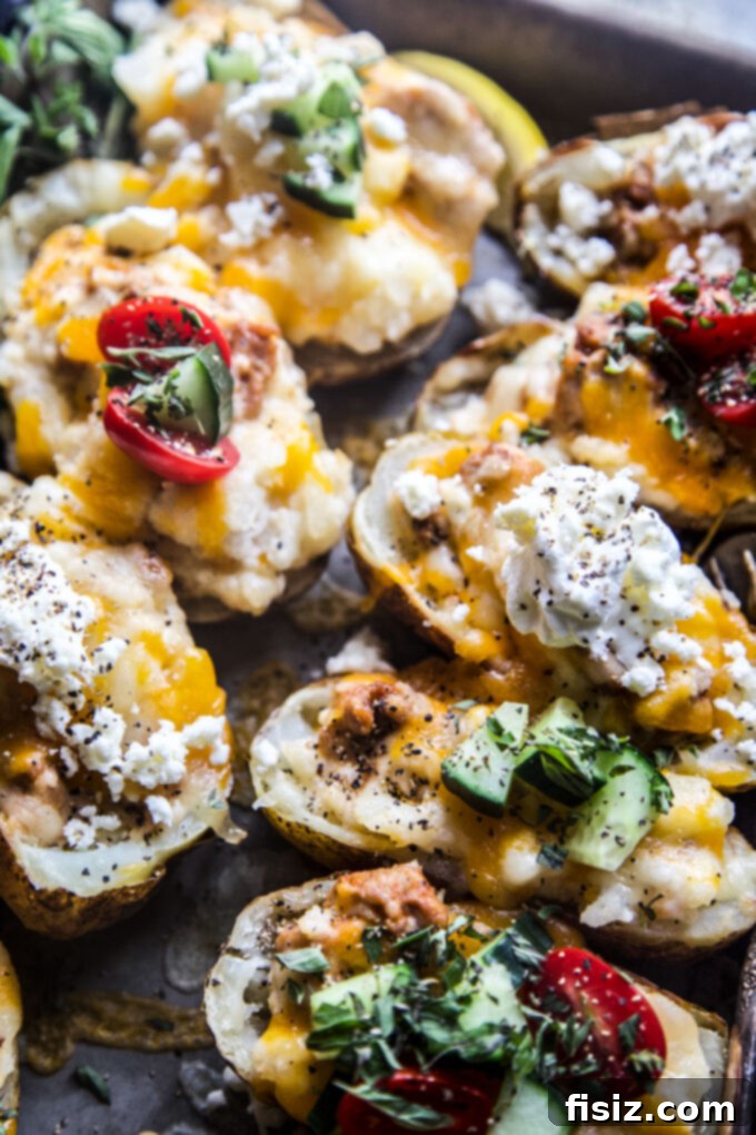 Twice-Baked Chicken Shawarma Potatoes 11 Close-up of Twice-Baked Chicken Shawarma Stuffed Potatoes with fresh garnishes