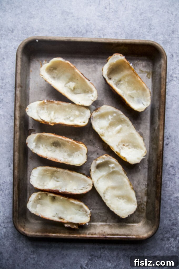 Twice-Baked Chicken Shawarma Potatoes 7 Baked potatoes sliced in half with the soft innards removed