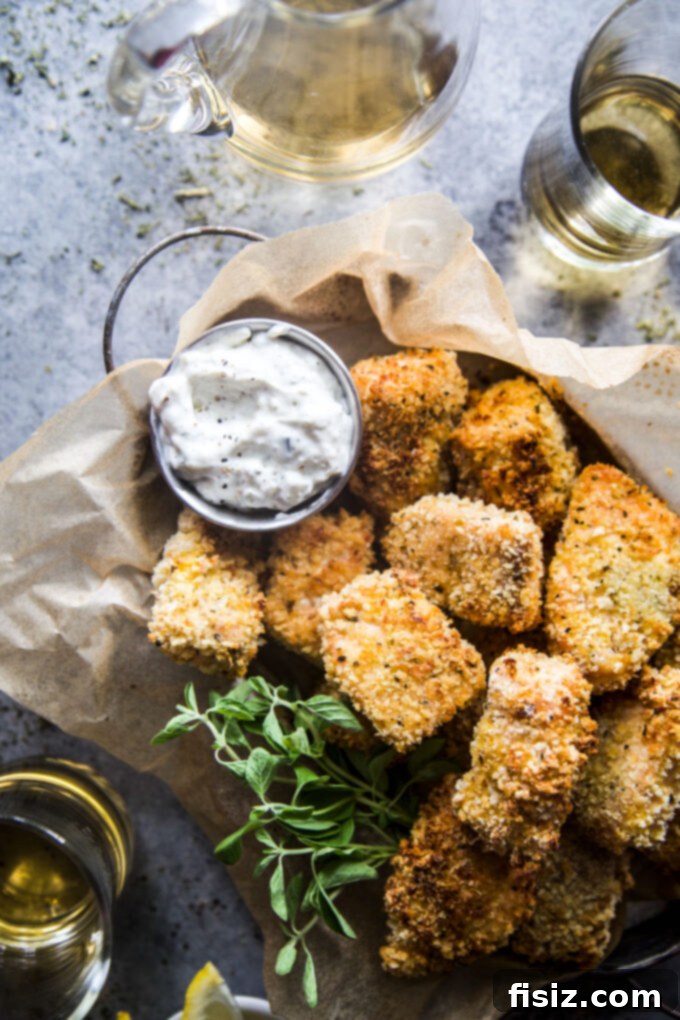 Crispy Air Fryer Greek Salmon Bites 7 Air fryer Greek salmon bites cooling on a rack after cooking
