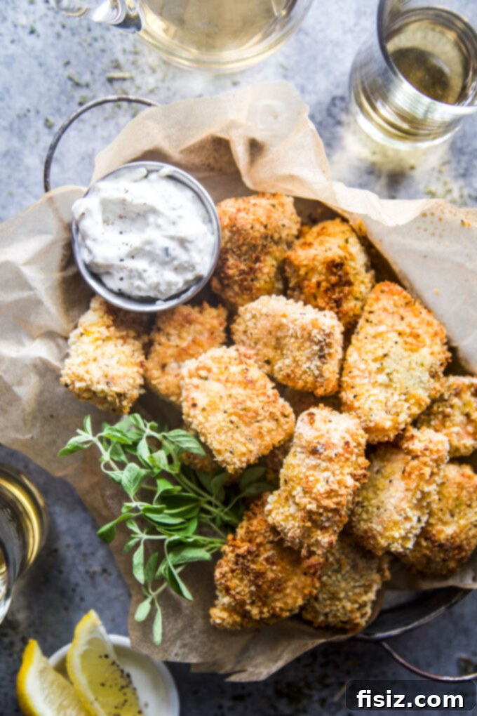 Crispy Air Fryer Greek Salmon Bites 8 A large platter of Air Fryer Greek Salmon Bites with various dipping sauces