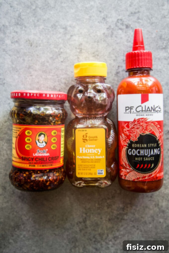 Chili Crisp Zucchini Sizzle 5 Ingredients: chili crisp, honey, and gochujang, key to a flavorful dish.