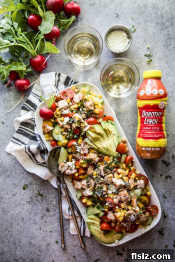 46 Must-Try August Recipes 8 Summer Chickpea Salad with Dorothy Lynch Grilled Chicken, ideal for a Labor Day picnic.