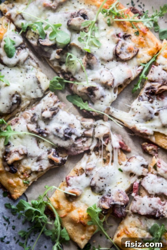 Cowboy Butter Steakhouse Pizza 11 cowboy butter steak pizza from a slightly elevated angle