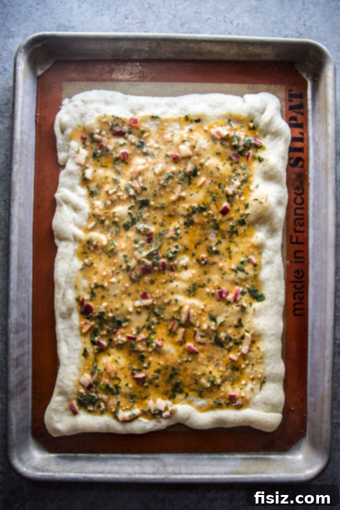 Cowboy Butter Steakhouse Pizza 7 a freshly baked cowboy butter steak pizza ready to be sliced