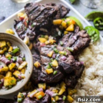 Spicy Jerk Lamb Loin Chops, Sweet Peach Salsa 12 Grilled Jerk American Lamb Loin Chops with Peach Salsa