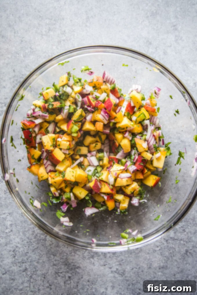 Spicy Jerk Lamb Loin Chops, Sweet Peach Salsa 7 Delicious and colorful fresh peach salsa in a serving bowl
