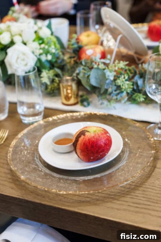 Dessert featuring an apple filled with frozen apple ice cream and chocolate drizzle