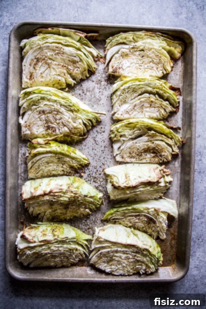 Golden Baked Cabbage Gratin 5 roasted cabbage on a baking sheet