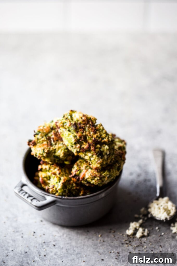 Gourmet Brussels Sprout Bacon Blue Cheese Tots 7 Pile of golden brown Bacon Blue Cheese Brussels Sprout Tater Tots with a side of dipping sauce