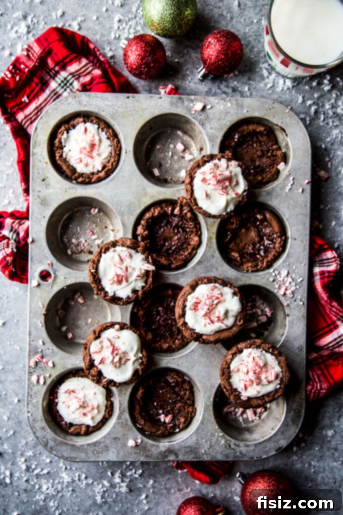 Frosty Peppermint Cream Chocolate Cookie Cups 2 Chocolate Cookie Cups with Whipped Peppermint Cream, perfect holiday dessert recipe from The Curious Plate