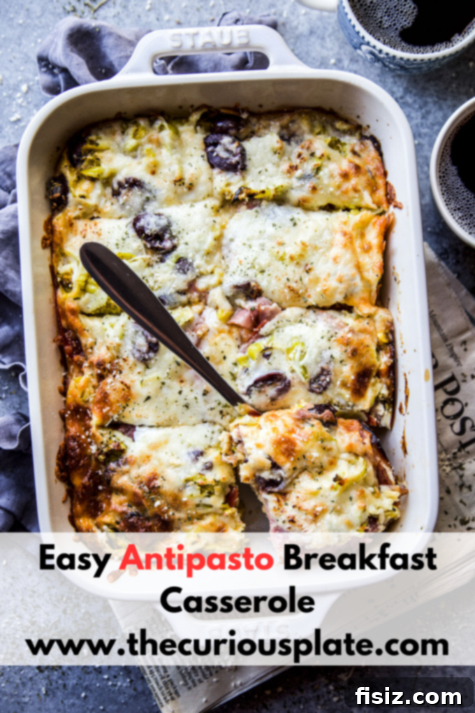 Savory Italian Brunch Bake 10 The full Easy Antipasto Breakfast Casserole in a baking dish, freshly baked and garnished, ready for serving