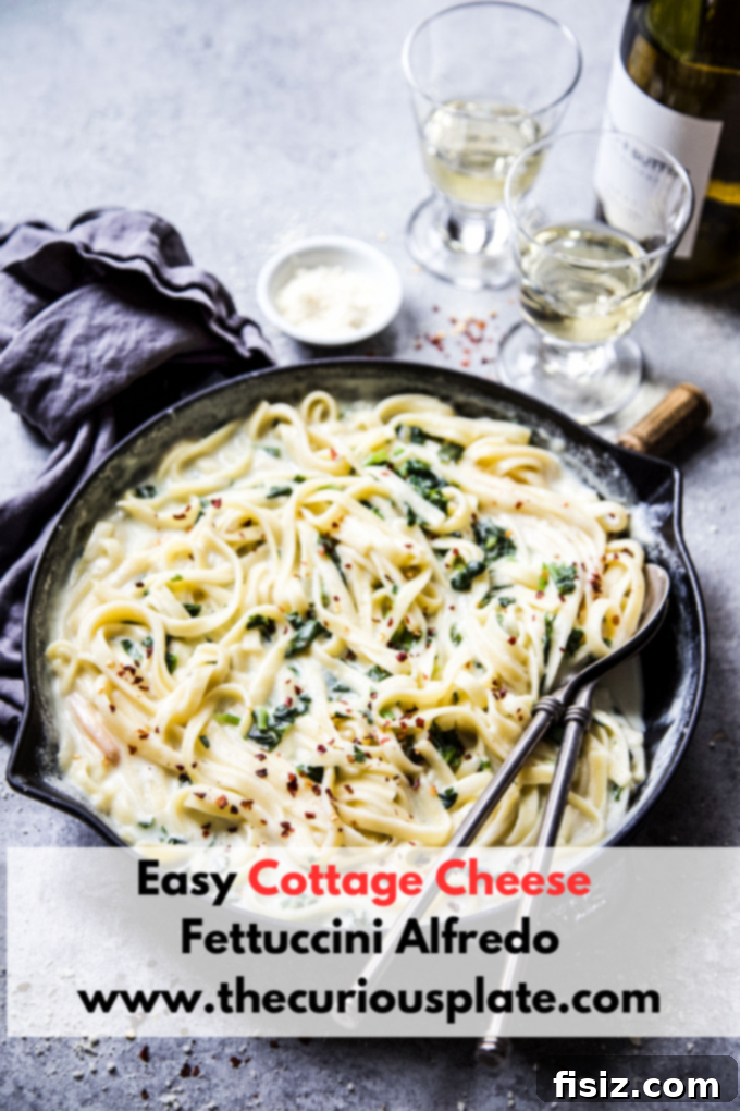 Effortless Creamy Cottage Cheese Alfredo 11 Easy Cottage Cheese Fettuccine Alfredo in a white bowl with fresh parsley
