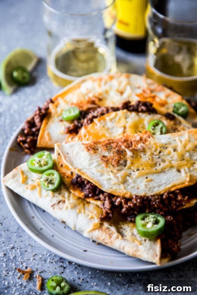 Smoky Brisket Tacos with a Crunchy Shell 3 crispy bbq beef tacos