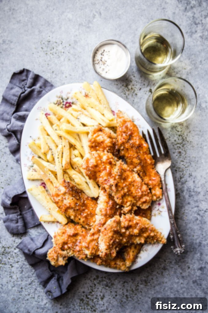 Honey Harissa Glazed Chicken Tenders 6 A plate of perfectly baked Harissa Honey Chicken Tenders, ready to be served.