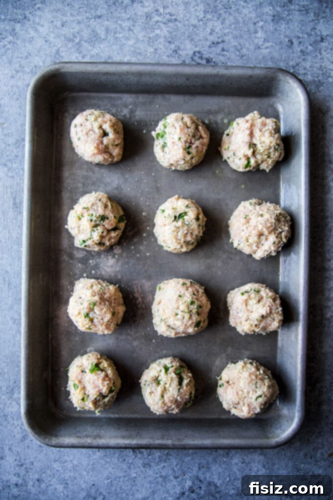 Creamy Polenta with Italian Wedding Chicken Meatballs 5 Perfectly formed raw chicken meatballs ready for baking