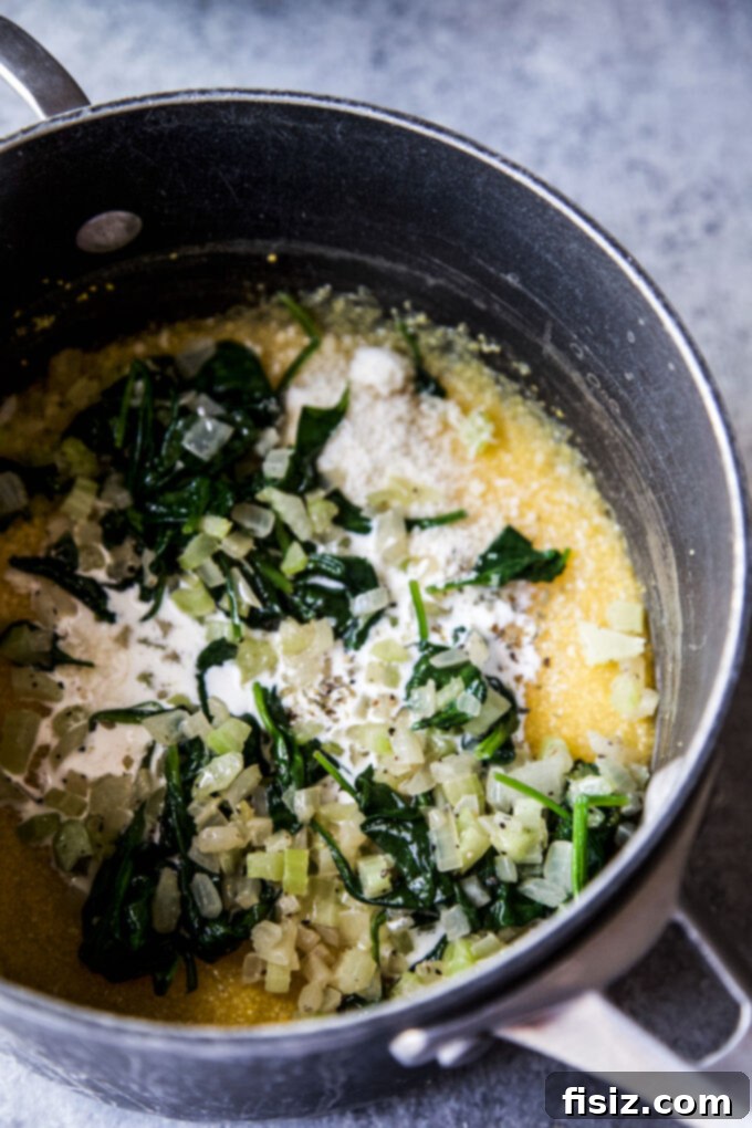 Creamy Polenta with Italian Wedding Chicken Meatballs 7 Creamy polenta simmering in a saucepan