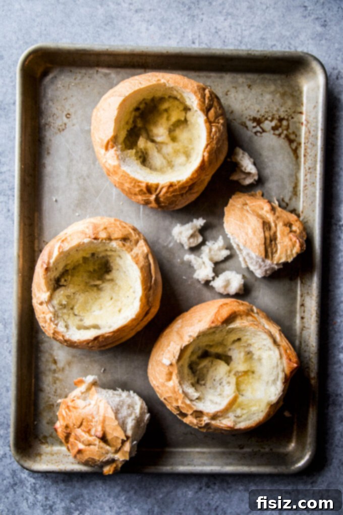 Loaded BBQ Sloppy Joe Bread Bowls 4 Hollowed out artisanal bread bowls, prepared and ready for filling