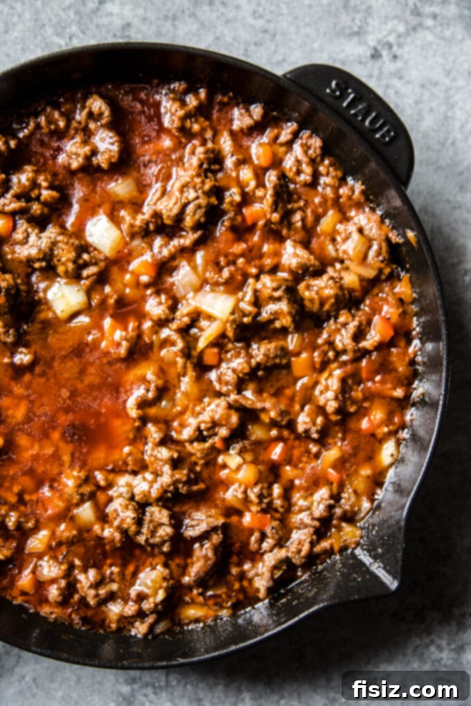 Loaded BBQ Sloppy Joe Bread Bowls 6 Close-up of the delicious sloppy joe mixture simmering in a skillet, rich and ready