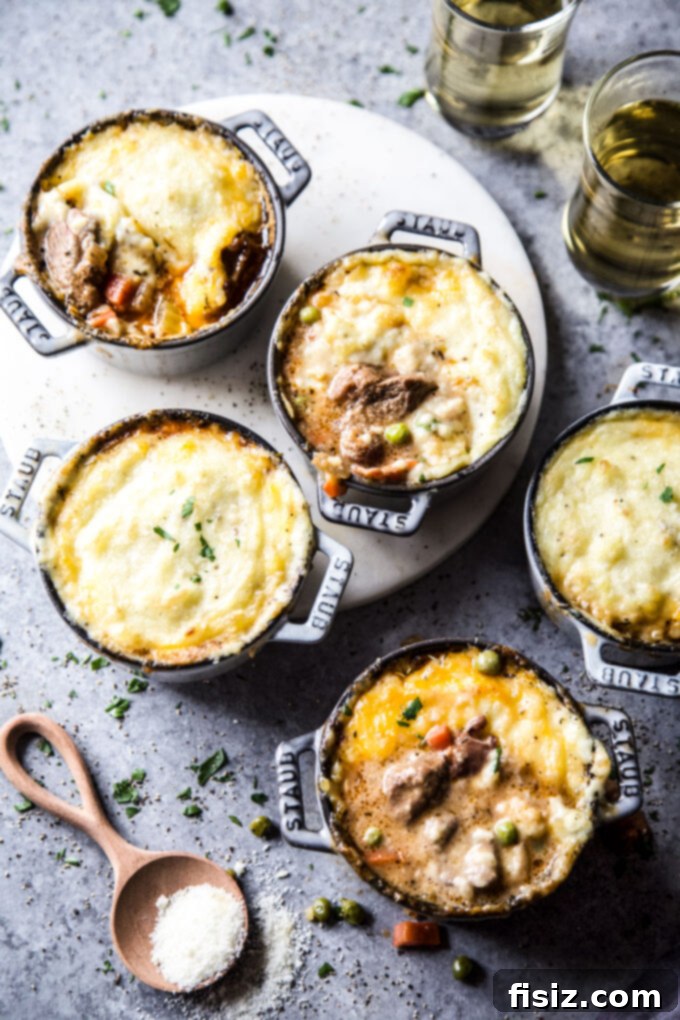 Individual American Lamb Shoulder Shepherd's Pie 18 A comforting close-up shot of a Mini American Lamb Shoulder Shepherd's Pie, ready to be enjoyed.