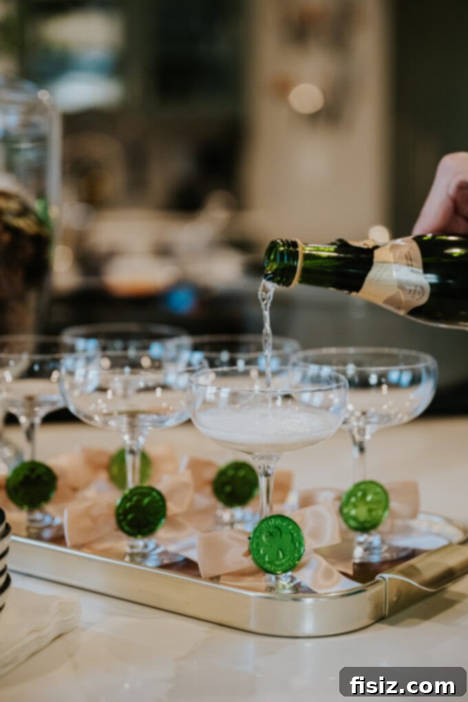 Individual American Lamb Shoulder Shepherd's Pie 10 Champagne being poured into flutes, suggesting a festive celebration.