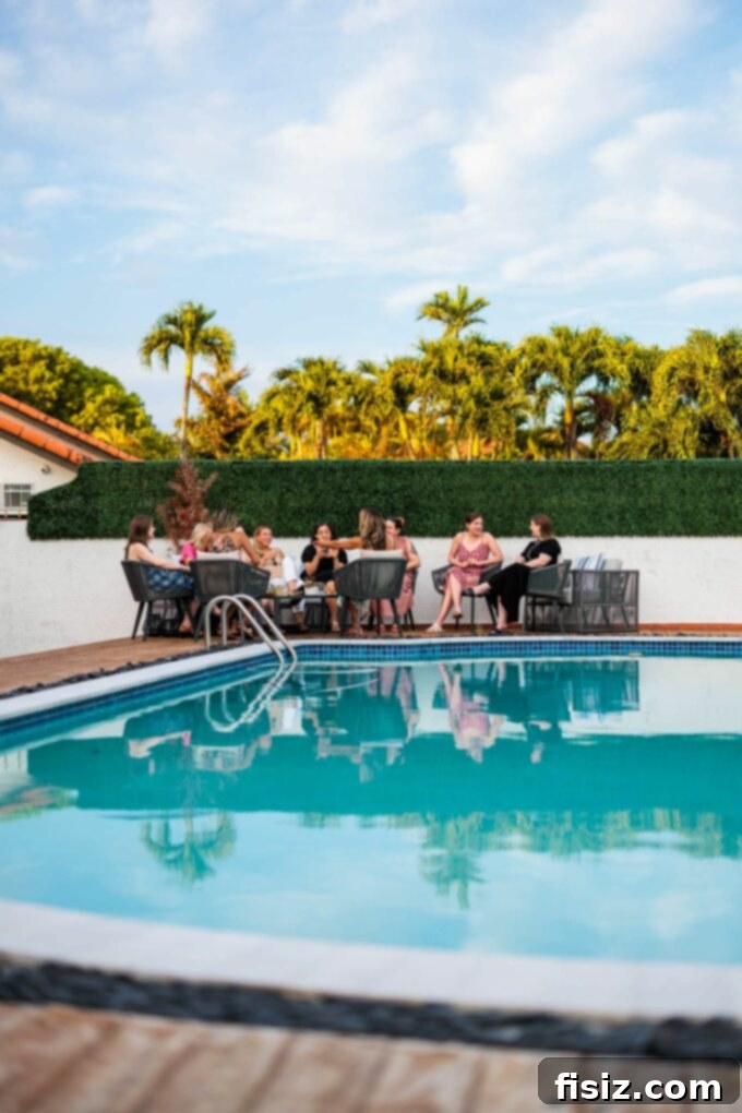 Elevate Your Outdoor Entertaining 5 Pro Tips 16 Outdoor patio seating near a pool, set for a relaxed gathering